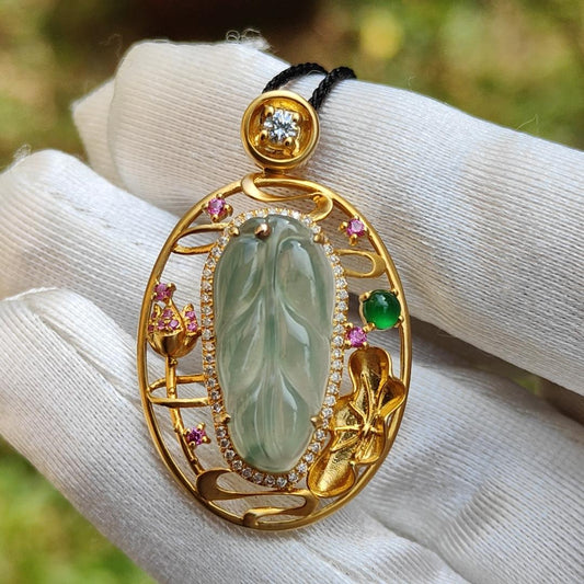 Premium Quality Icy light green with patches Natural Type A Jadeite Jade crafted as Leaf set on 18k Gold with 1 Green Cabochon and Diamonds, Certificate included weigh 4.36 grams, Measurement 35.3 * 22 * 8.2 mm (18kp25)