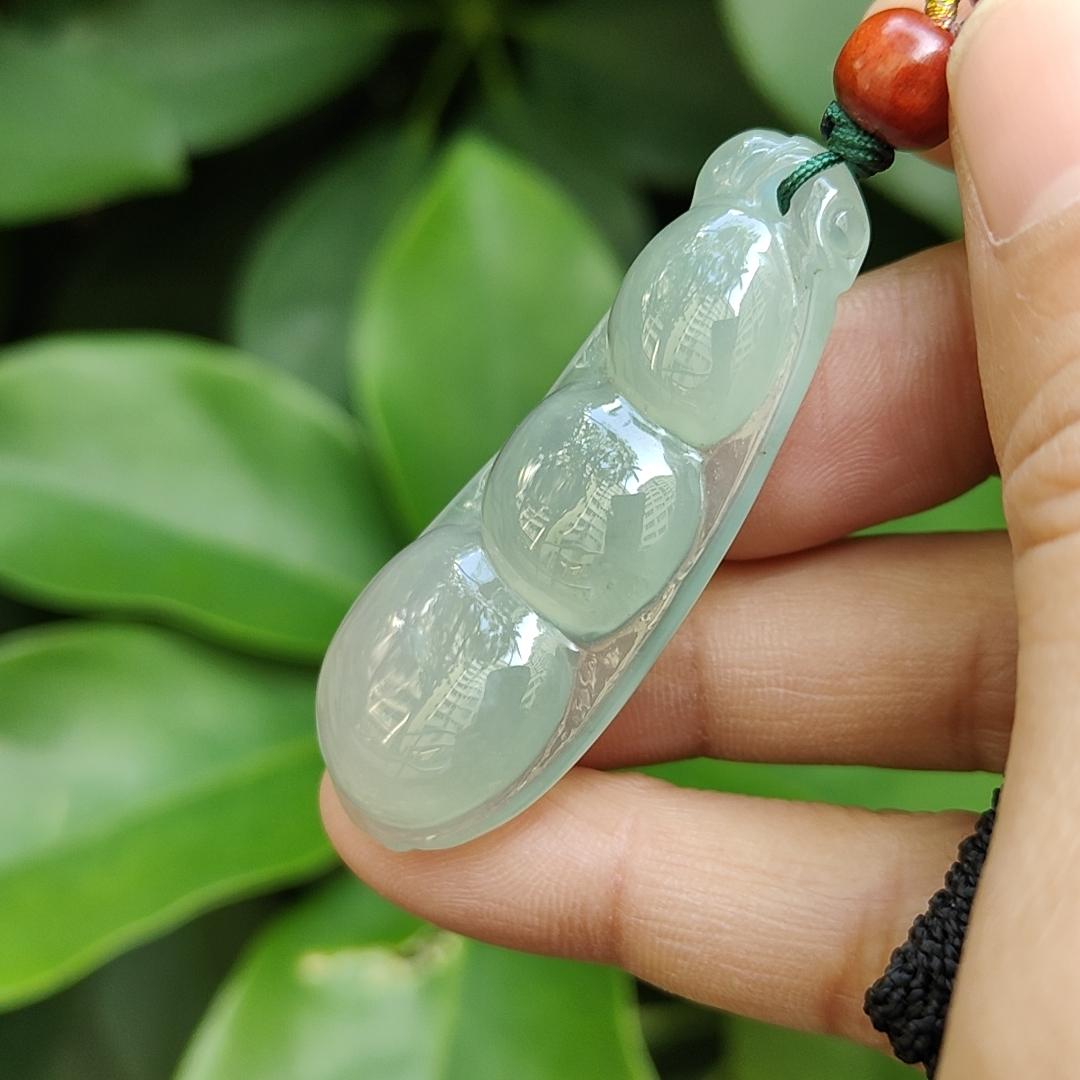 Premium Quality Icy Translucent Green Hue crafted as French Bean Natural Type A Jadeite Jade as Pendant, certificate weighs 12.37 grams, measurement 49.9 * 20 * 7.6 mm (pendant297)