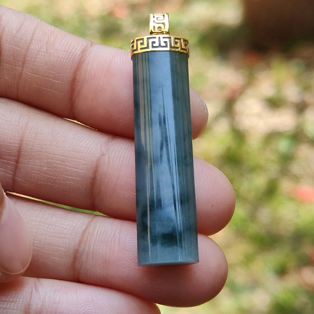 Dark Bluish Green Natural Type A Jadeite Jade crafter with a shape of Cylinder set with 18k gold clasp as Pendant, certificate included weigh 6.49 grams, measurement 37.6 * 9.6 * 6.3 mm (18kp28)