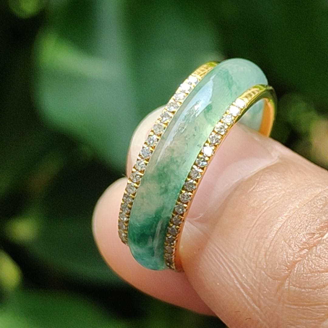 Icy Translucent Green Floating Patches Natural Type A Jadeite Jade crafted as Ring designed with removable 18k Gold, certificate weighs 4.65 grams, measurement 6.3 * 2.9 mm, finger size 17.1 mm (18kring29)