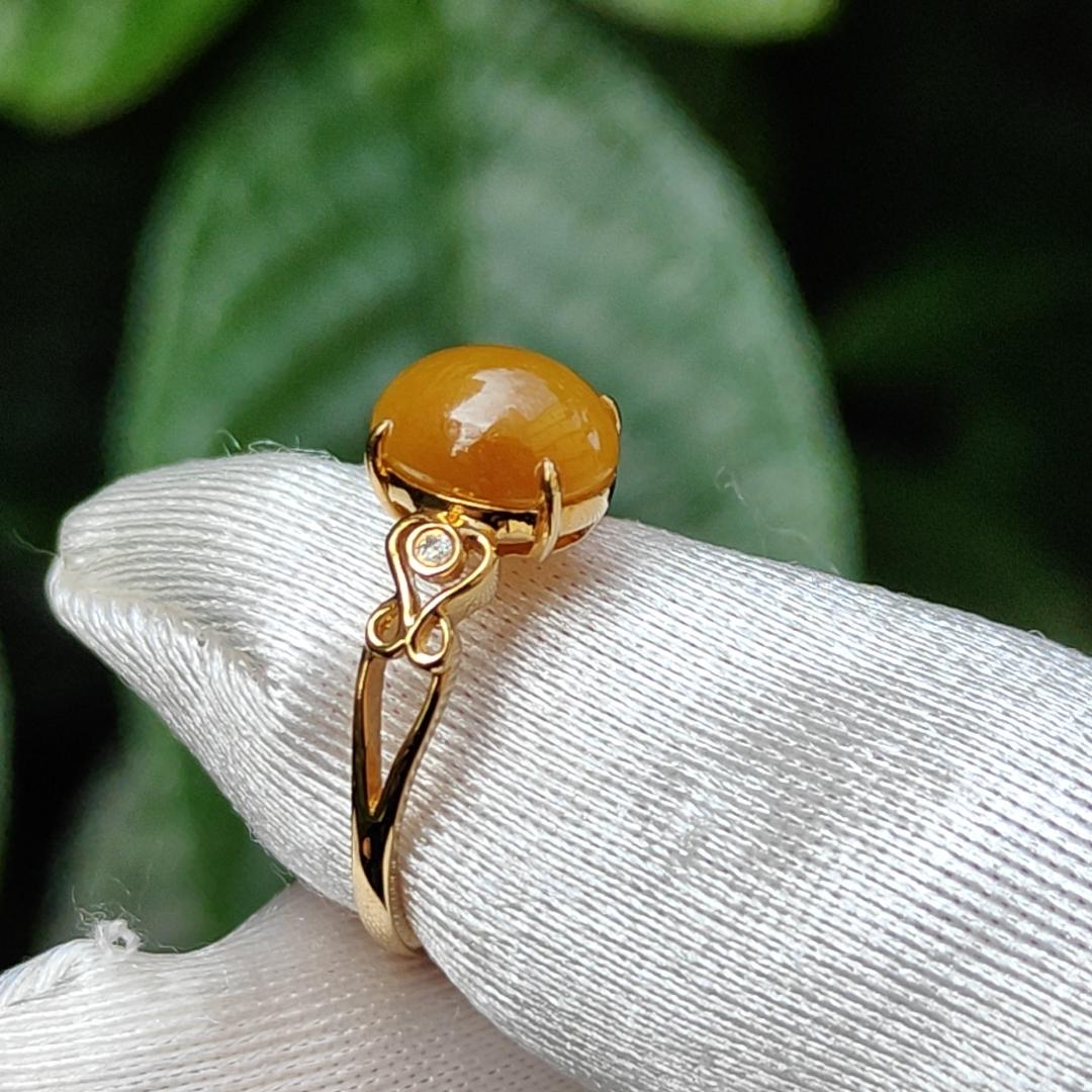 Yellow with a bit reddish Natural Type A Jadeite Jade Cabochon 8.6 * 7 * 3.6 mm set on 18k Gold as Ring adding 2 diamonds with certificate weigh 2.08 grams, finger size 16.8 mm (18kring13)