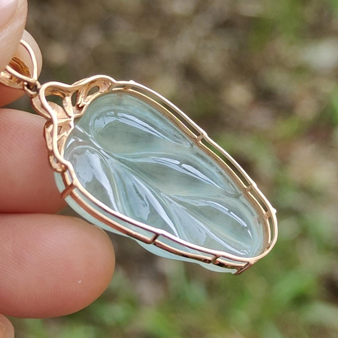 Premium Quality Icy Translucent Light Green Hue Natural Type A Jadeite Jade crafted as Leaf set on 18k Gold as Pendant, certificate weighs 5.07 grams, measurement 40.5 * 18 * 7.5 mm (18kp42)