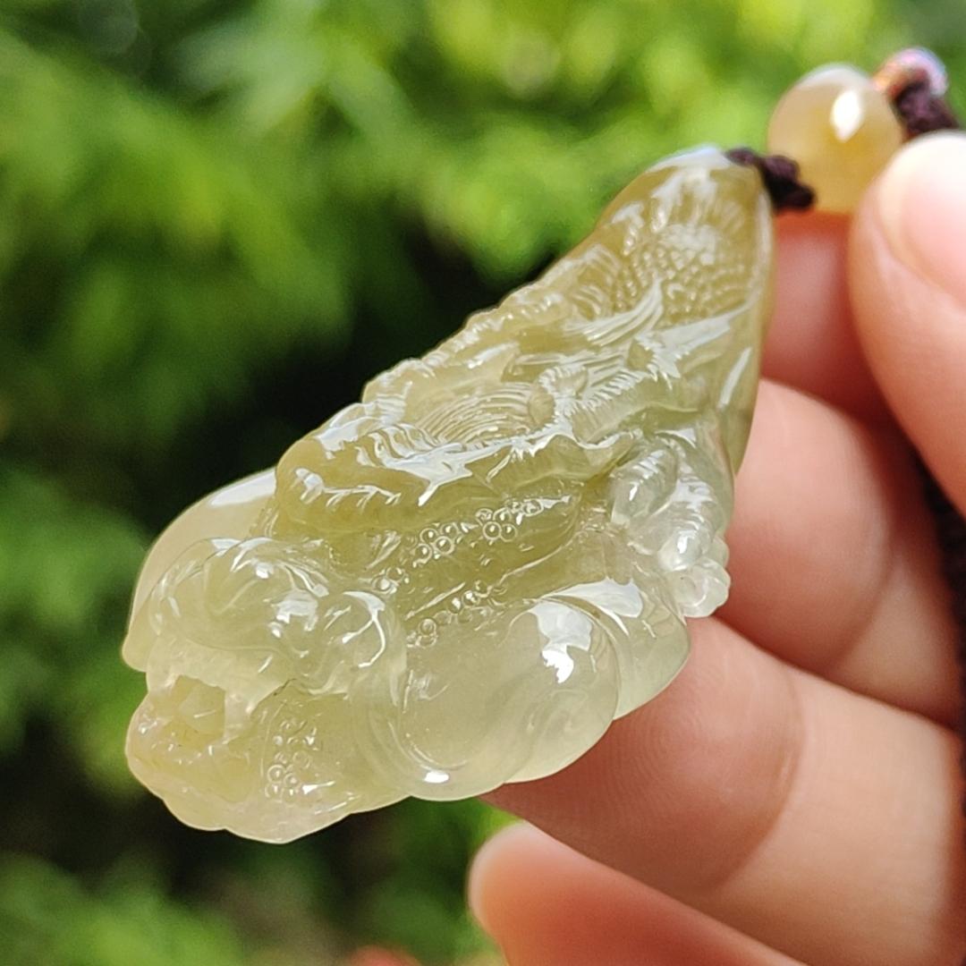 Premium Icy Yellow Natural Type A Jadeite Jade crafted with Dragon as Pendant certificate weighs 15.64 grams, measurement 50.6 * 27 * 11.5 mm (pendant253)