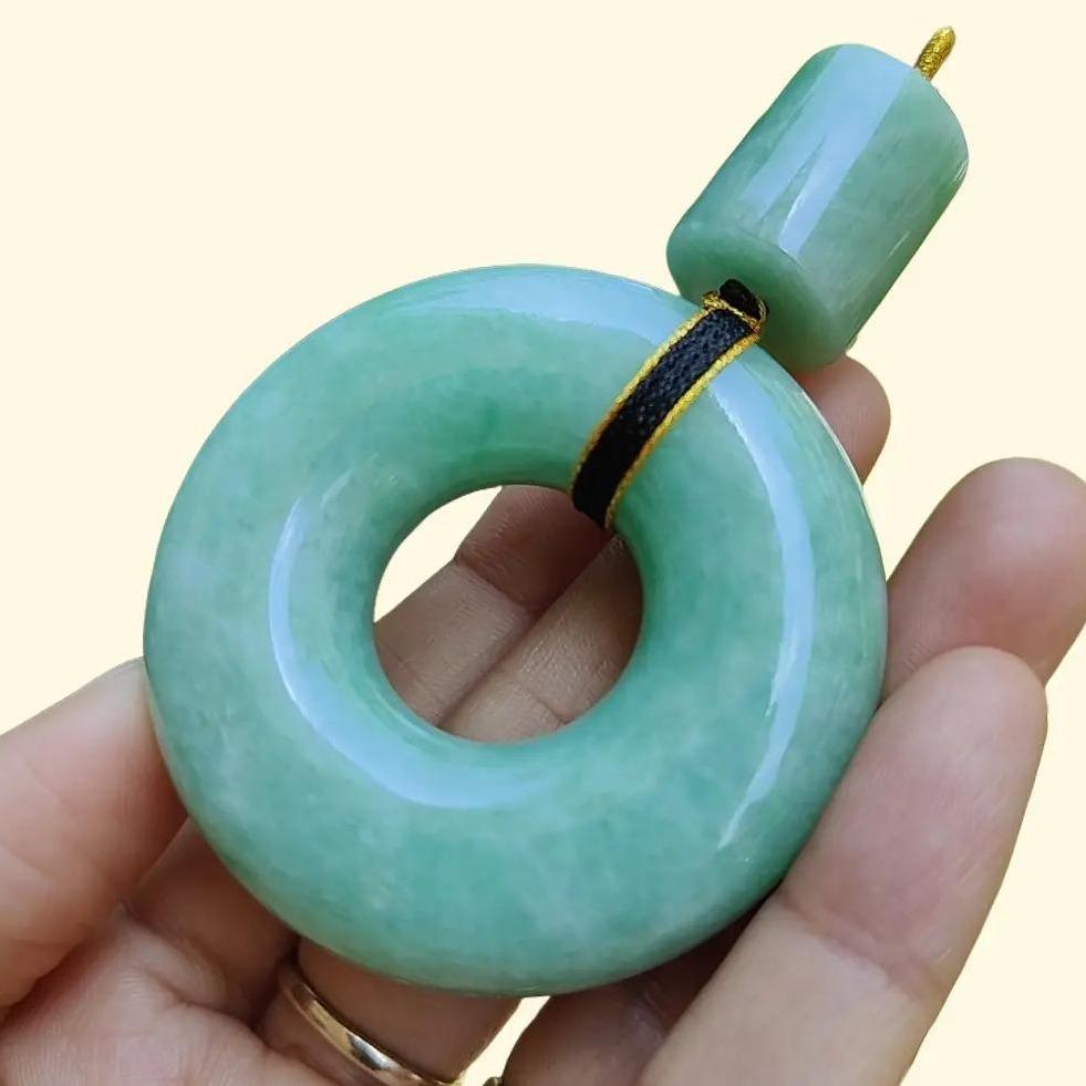 Hugh Light Green crafted with Shape of Donut and Cylinder Natural Type A Jadeite Jade as Pendant, certificate weighs 73.85 and 12.55 grams, measurements 52.8 * 52.7 * 14.3, 19.1 * 16.3 mm (pendant290)