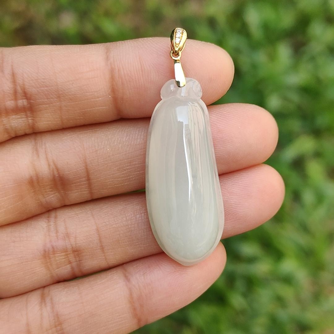 Semi Icy Natural Type A Jadeite Jade crafted with Blessing Melon as Pendant adding 18k gold clasp with certificate weigh 7.46 grams, measurement 36.3 * 14.5 * 8.3 mm (18kp30)