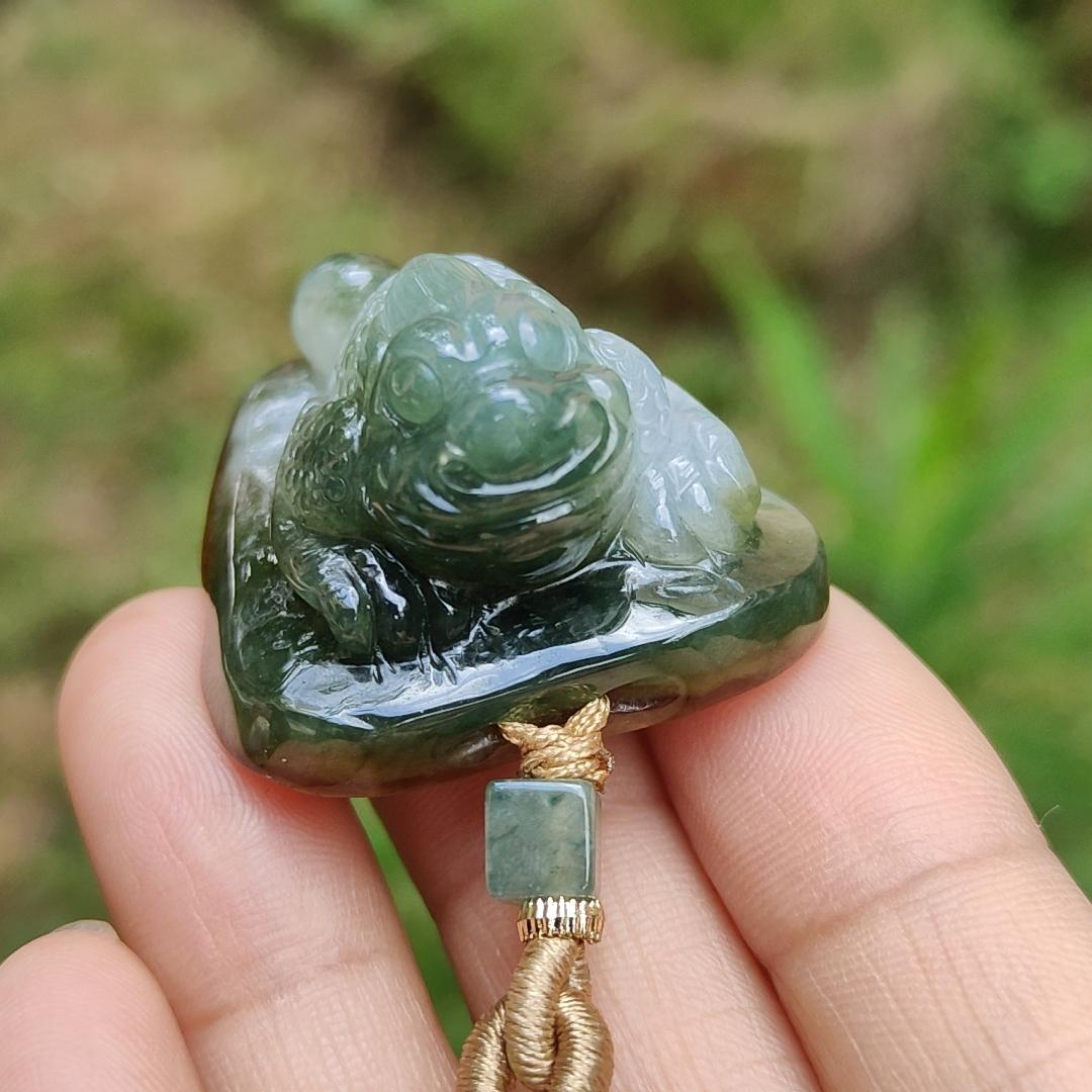 Brown Skin and Green Natural Type A Jadeite Pendant crafted with three leg toad and Chinese ingot, symbols of Fortune and good fortune, Auspicious and wealthy means to urge wealth, with ceritificate weigh 30.06 grams, 32.8 * 32 * 22.2 mm (pendant69)