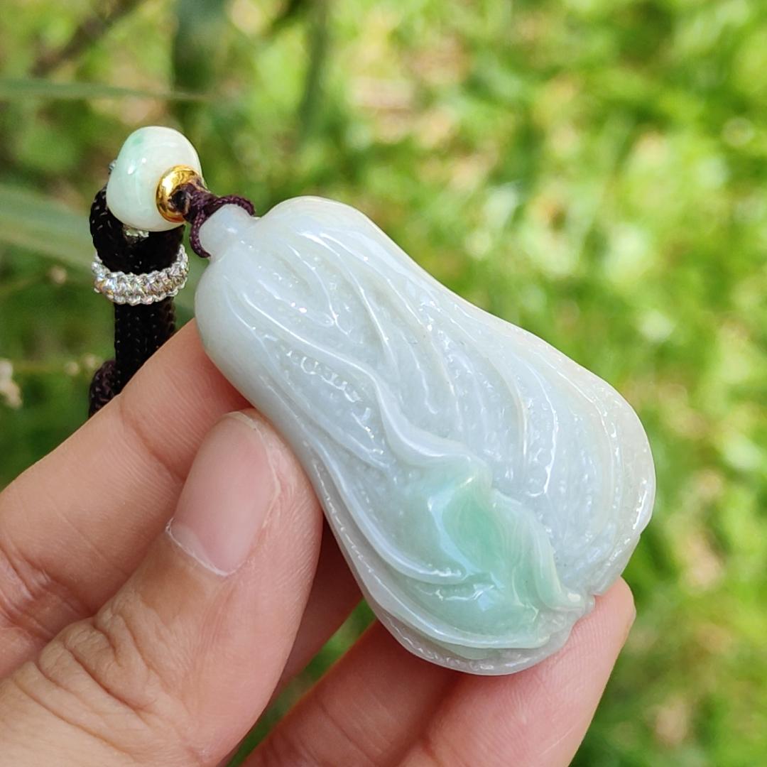 Crafted as Chinese cabbage with patches of light green Natural Type A Jadeite Pendant Necklace with GIC approved labs certificate weigh 31.92 grams, 46.8 * 27.3 * 18 mm, symbols of Boosts wealth, purity, and good weather, suitable for daily wear