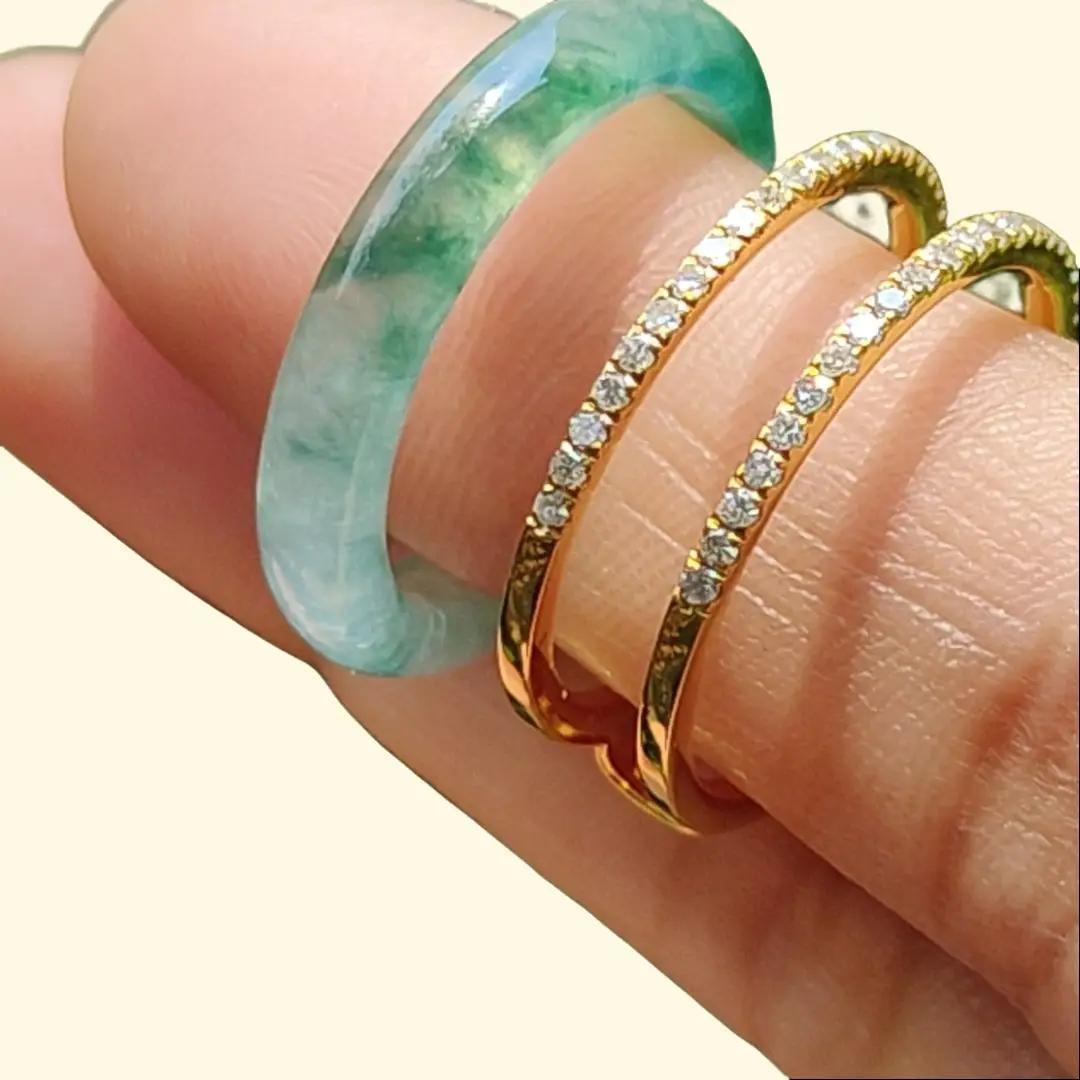 Icy Translucent Green Floating Patches Natural Type A Jadeite Jade crafted as Ring designed with removable 18k Gold, certificate weighs 4.65 grams, measurement 6.3 * 2.9 mm, finger size 17.1 mm (18kring29)