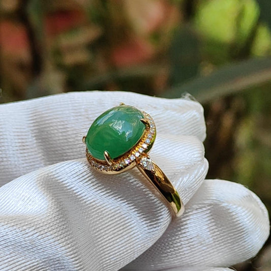 18K Gold weigh 2 grams, Setting with Natural Type A Jadeite Green Cabochon size 10.7 * 8.3 * 3.8 mm with 35 * 0.003 and 2 * 0.03 pear cut diamonds, certificate included weigh 2.65 grams, Finger ring size 17.3 mm,