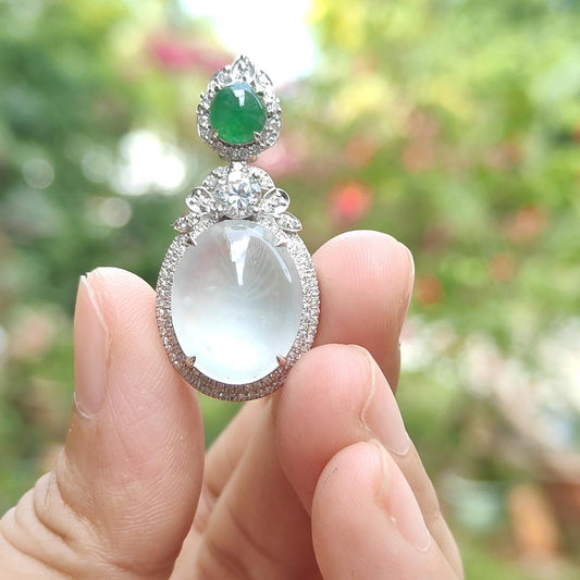 18k Gold Pendant Setting with 1 green cabochon and small diamonds with 1 CZ, Old Mine Natural Type A Jadeite with NGI Gemstone report weight 4.94 grams , 15.66 * 12.60 * 6.00 mm which is Highly Translucent Icy and very fine grain crystal aggregate (18kp8)