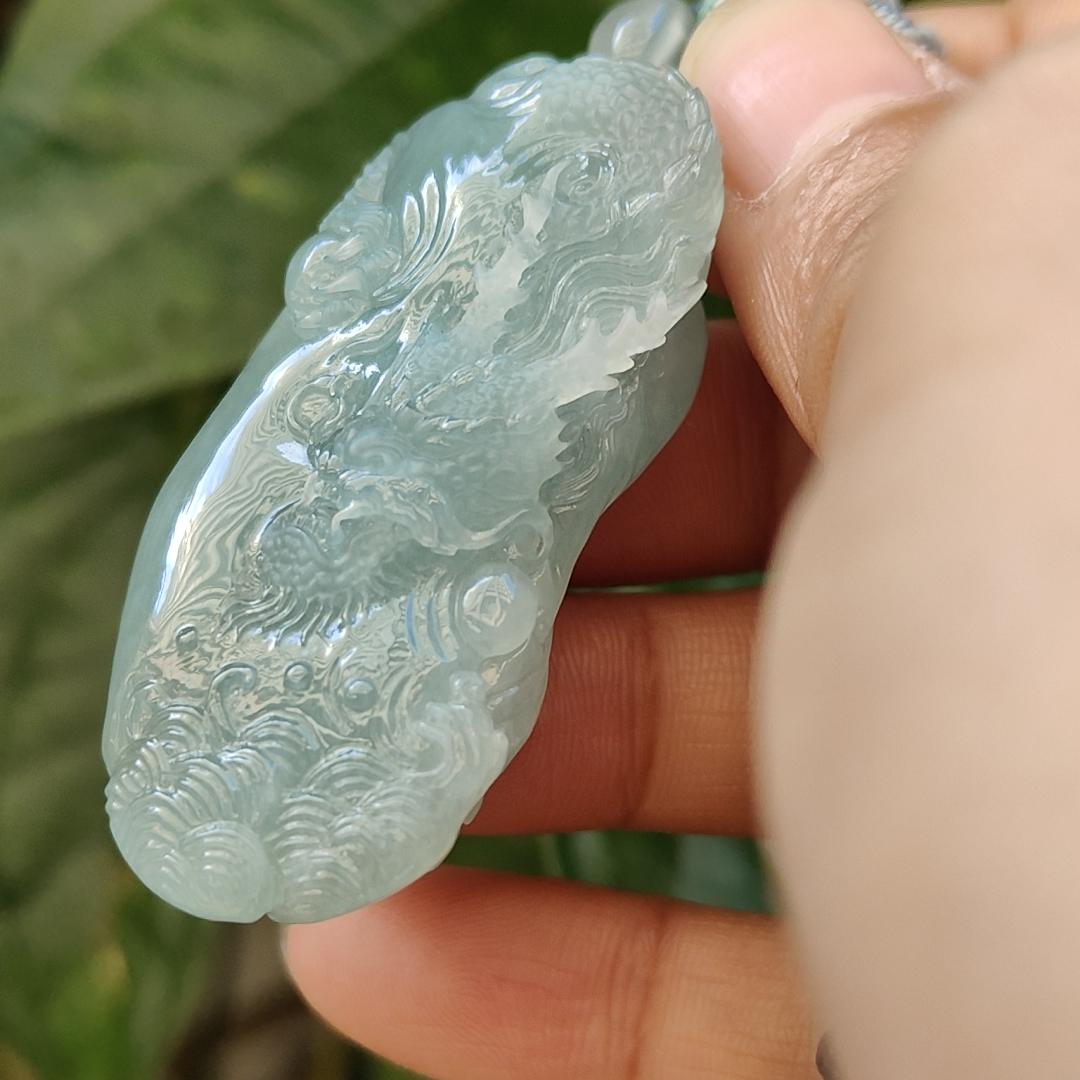 Natural Type A Jadeite Jewellery Pendant carved with dragon weighs at 30.06 grams , 50.32 * 23.30 * 12.93 mm - with Gemstone report from NGI - Very Good Translucency with faint greenish blue (pendant140)