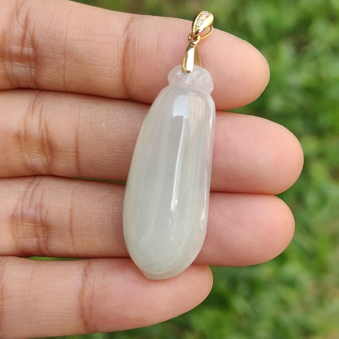 Semi Icy Natural Type A Jadeite Jade crafted with Blessing Melon as Pendant adding 18k gold clasp with certificate weigh 7.46 grams, measurement 36.3 * 14.5 * 8.3 mm (18kp30)