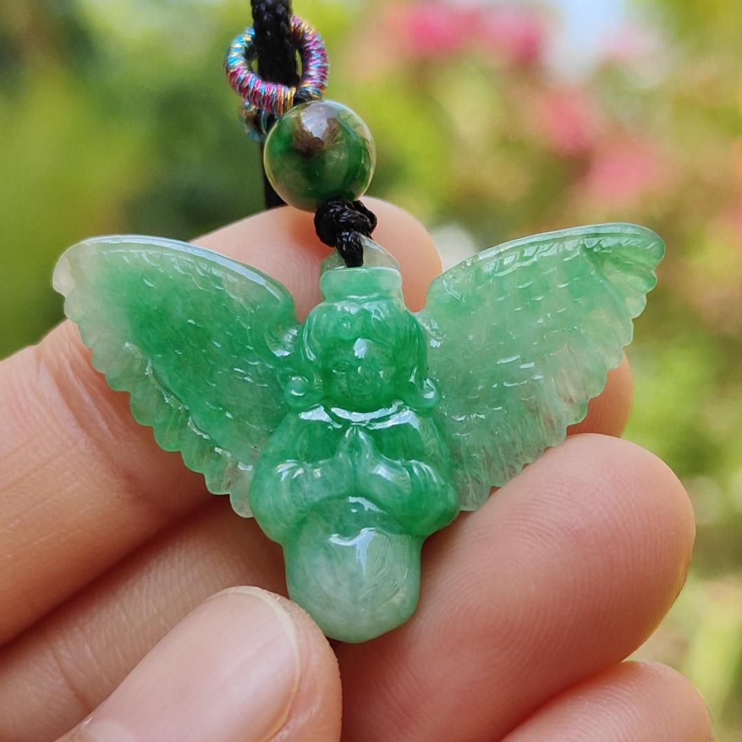 Green Jadeite carved as Angel (Front) and Cross (back) Natural Type A Jadeite pendant with NGI Gemstone report weight 6.33 gram , 35.39 * 23.76 * 5.61 mm with Translucent fine grain crystal aggregate granular and fibrous interlocking texture (pendant139)