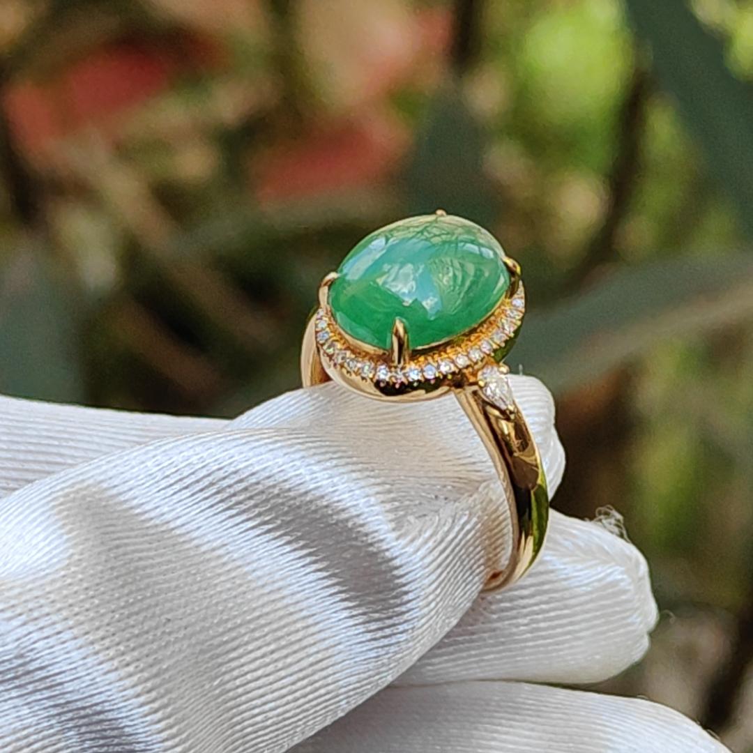 18K Gold weigh 2 grams, Setting with Natural Type A Jadeite Green Cabochon size 10.7 * 8.3 * 3.8 mm with 35 * 0.003 and 2 * 0.03 pear cut diamonds, certificate included weigh 2.65 grams, Finger ring size 17.3 mm,