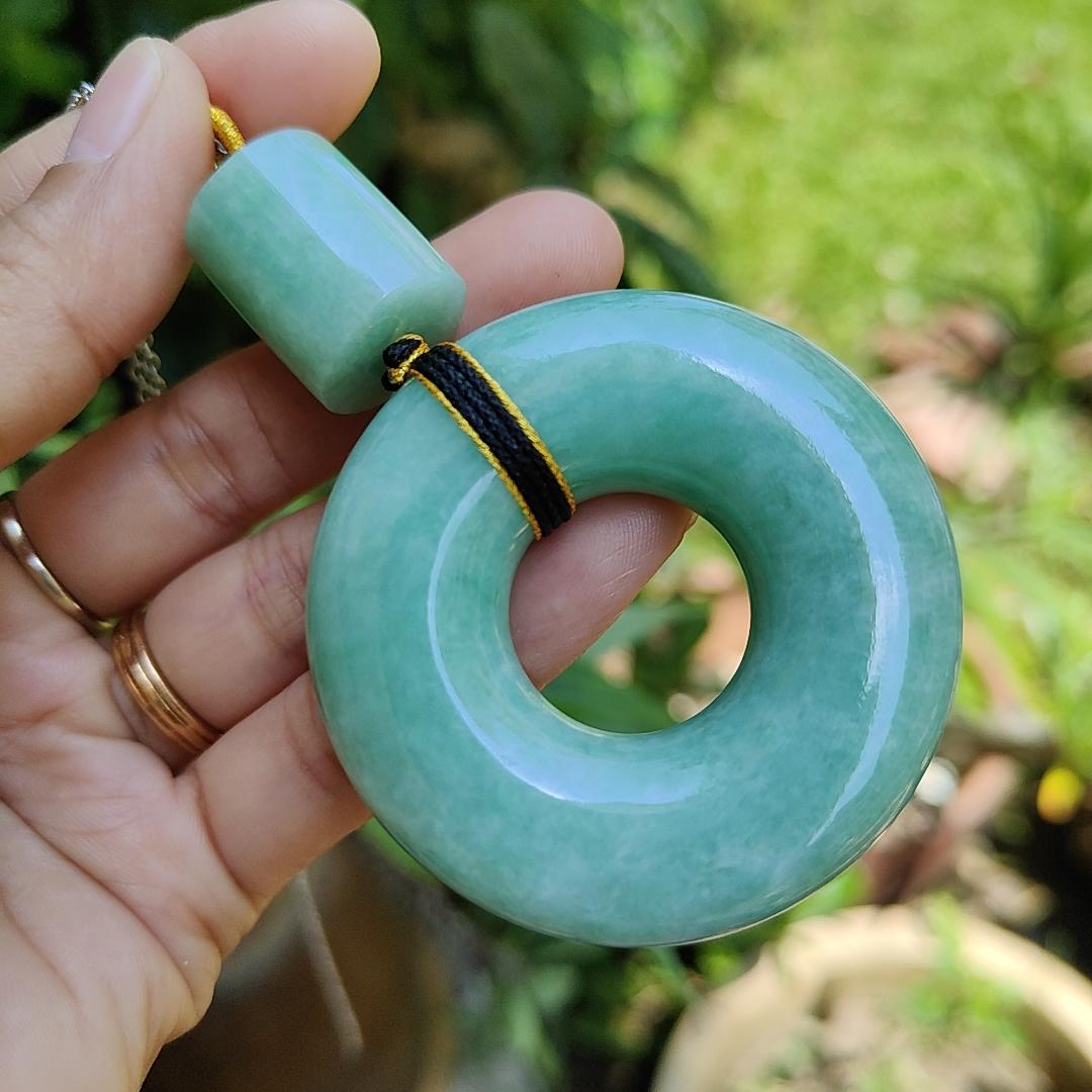 Hugh Light Green crafted with Shape of Donut and Cylinder Natural Type A Jadeite Jade as Pendant, certificate weighs 73.85 and 12.55 grams, measurements 52.8 * 52.7 * 14.3, 19.1 * 16.3 mm (pendant290)