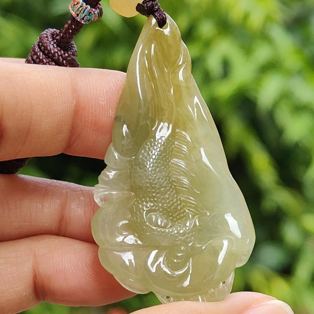 Premium Icy Yellow Natural Type A Jadeite Jade crafted with Dragon as Pendant certificate weighs 15.64 grams, measurement 50.6 * 27 * 11.5 mm (pendant253)