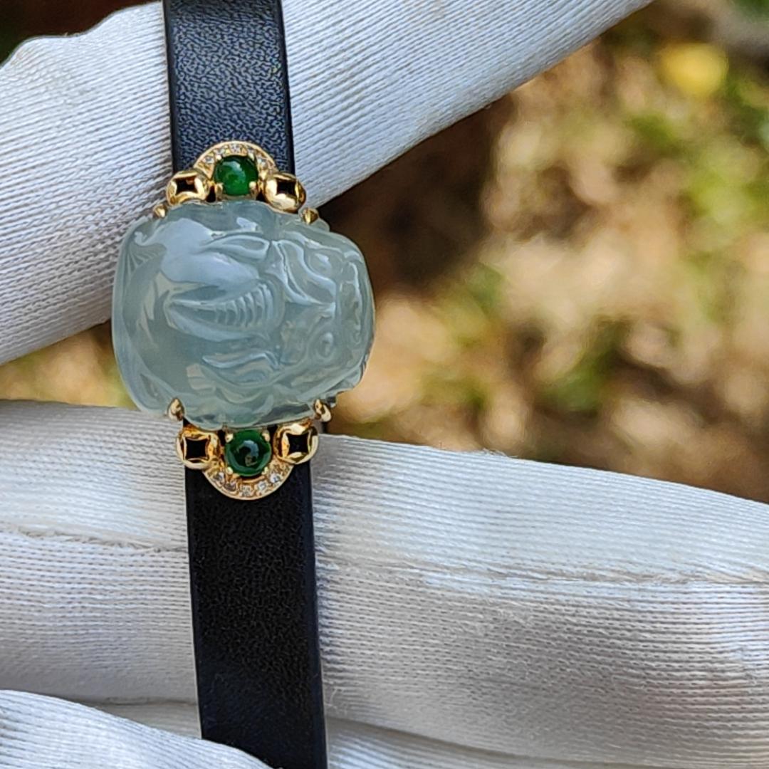 Light Green Hue Natural Type A Jadeite Jade crafted as Pixiu set on 18k Gold with 2 Green Cabochon and diamonds, adding PU wrist band upgraded elegant style bracelet, certificate weigh 4.44 grams, measurement 16.6 * 14.1 * 7.5 mm (18kpw1)