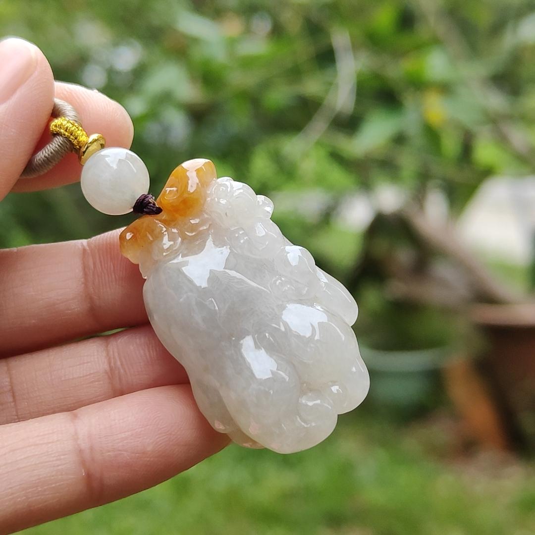 Unique Yellow Ruyi Chayote Natural Type A Jadeite Pendant with QIC approved labs certificate weight 25.27 grams, 40 * 25 * 15.20 mm originate from Myanmar very suitable for daily wear (pendant119)