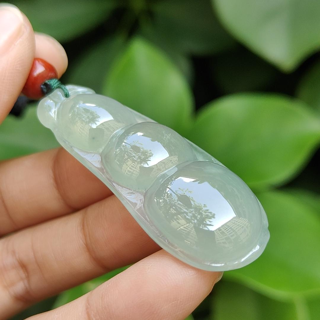 Premium Quality Icy Translucent Green Hue crafted as French Bean Natural Type A Jadeite Jade as Pendant, certificate weighs 12.37 grams, measurement 49.9 * 20 * 7.6 mm (pendant297)