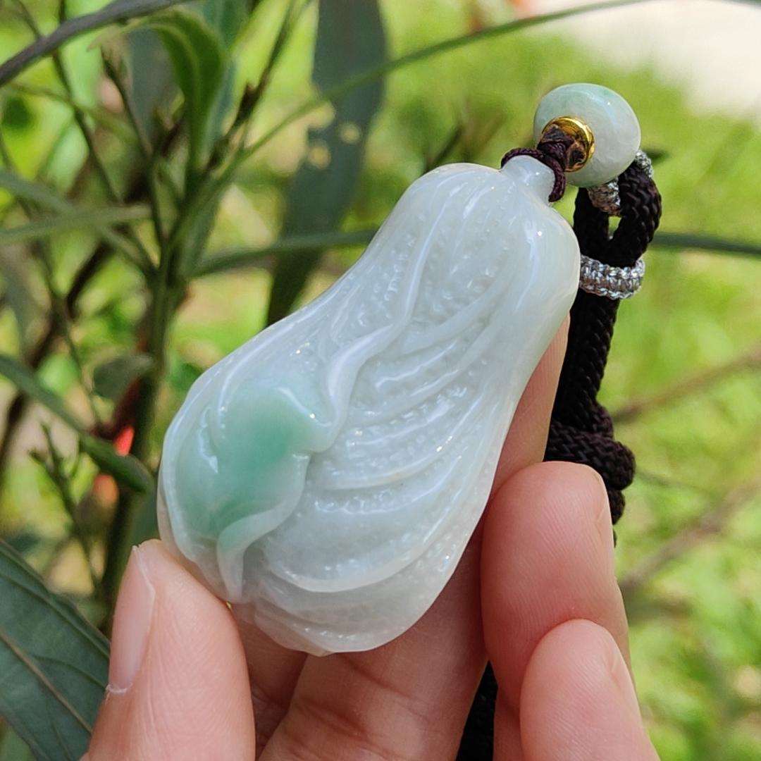 Crafted as Chinese cabbage with patches of light green Natural Type A Jadeite Pendant Necklace with GIC approved labs certificate weigh 31.92 grams, 46.8 * 27.3 * 18 mm, symbols of Boosts wealth, purity, and good weather, suitable for daily wear