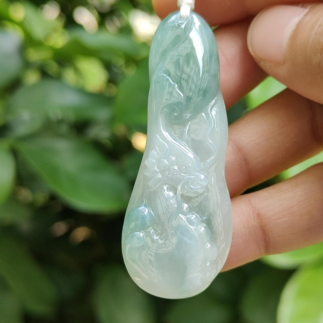 Good Quality Beautiful Natural Type A Jadeite Jade Light Green with Green Hue crafted with Dragon as Pendant, QIC labs approved certificated weigh 15.74 grams, measurements 56 * 20.5 * 6.2 mm (pendant296)