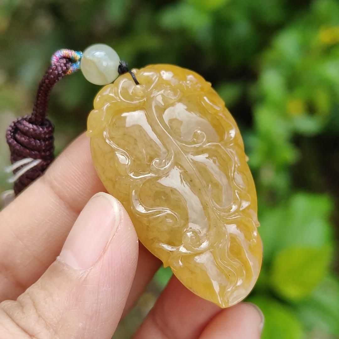 Very fine and old full Yellow Natural Type A Jadeite Pendant carved as a leave and a Mythical Beast on it with certificate weight 16.02 grams, 44 * 26 * 10 mm meaning Good luck and auspiciousness (pendant107)