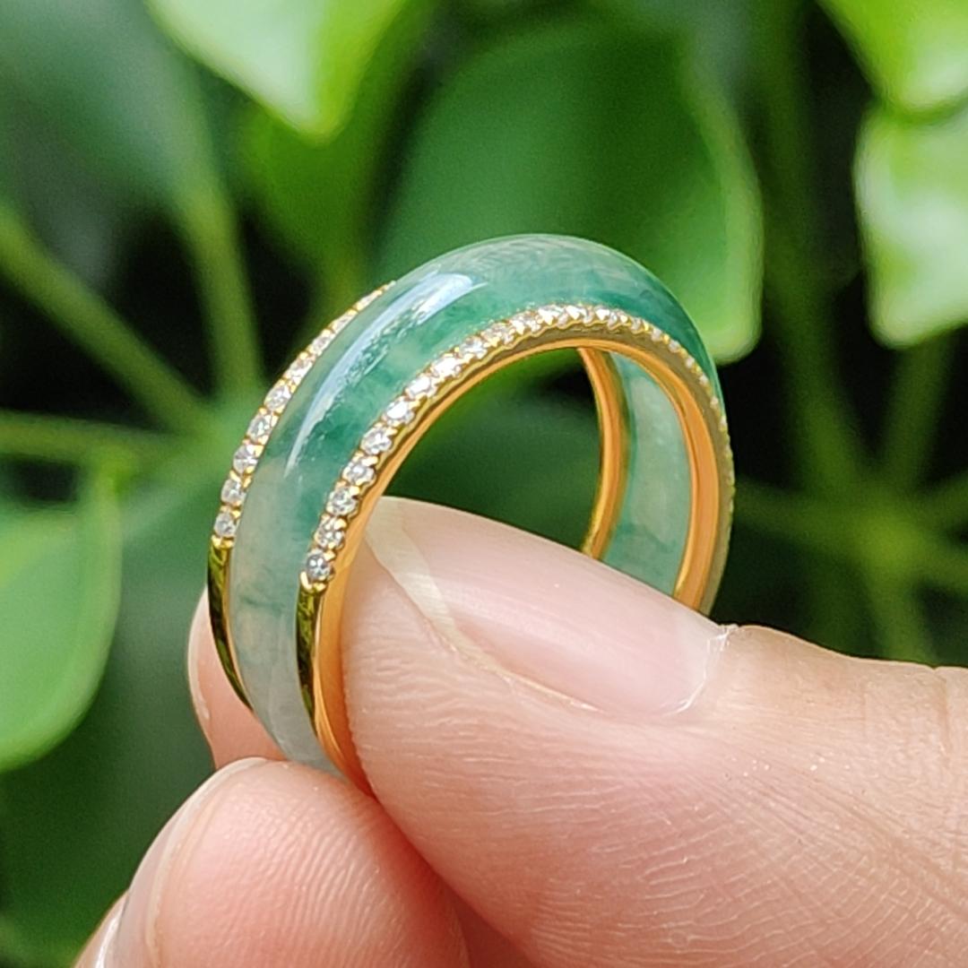 Icy Translucent Green Floating Patches Natural Type A Jadeite Jade crafted as Ring designed with removable 18k Gold, certificate weighs 4.65 grams, measurement 6.3 * 2.9 mm, finger size 17.1 mm (18kring29)