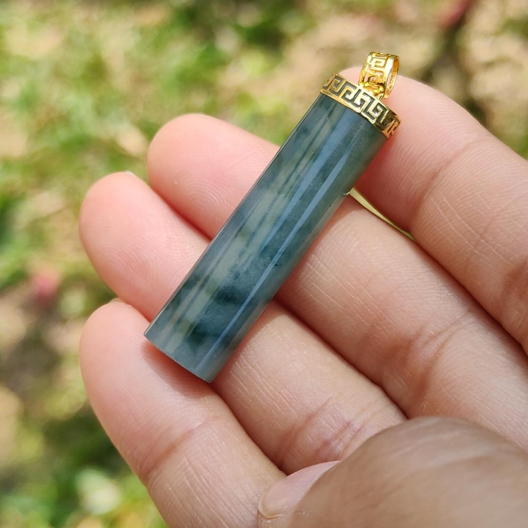 Dark Bluish Green Natural Type A Jadeite Jade crafter with a shape of Cylinder set with 18k gold clasp as Pendant, certificate included weigh 6.49 grams, measurement 37.6 * 9.6 * 6.3 mm (18kp28)