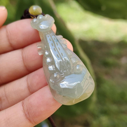 Semi Icy Rare Yellow and Green Natural Type A Jadeite Jade crafted as Ruyi musical instrument pipa as Pendant with certificate weigh 9.08 grams, measurement 45.3 * 18.7 * 6.6 mm (pendant226)