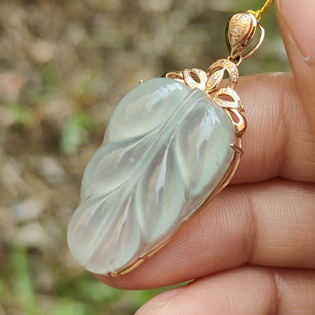 Premium Quality Icy Translucent Light Green Hue Natural Type A Jadeite Jade crafted as Leaf set on 18k Gold as Pendant, certificate weighs 5.07 grams, measurement 40.5 * 18 * 7.5 mm (18kp42)