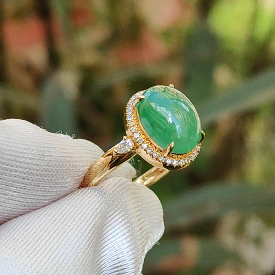 18K Gold weigh 2 grams, Setting with Natural Type A Jadeite Green Cabochon size 10.7 * 8.3 * 3.8 mm with 35 * 0.003 and 2 * 0.03 pear cut diamonds, certificate included weigh 2.65 grams, Finger ring size 17.3 mm,