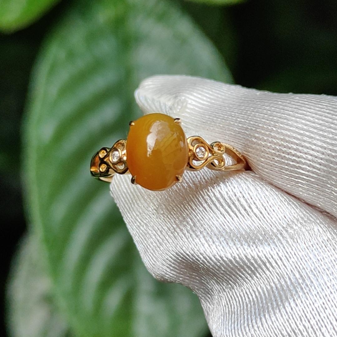 Yellow with a bit reddish Natural Type A Jadeite Jade Cabochon 8.6 * 7 * 3.6 mm set on 18k Gold as Ring adding 2 diamonds with certificate weigh 2.08 grams, finger size 16.8 mm (18kring13)