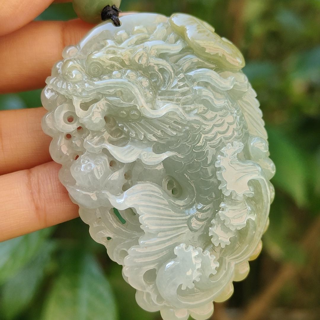 Tea Green Yellow Natural Type A Jadeite Pendant Carved as Dragon Head Fish Body meaning Prosperity, wealth and happiness with certificate weighs 49.67 grams, 62.60 * 43.50 * 12.10 mm (pendant93)