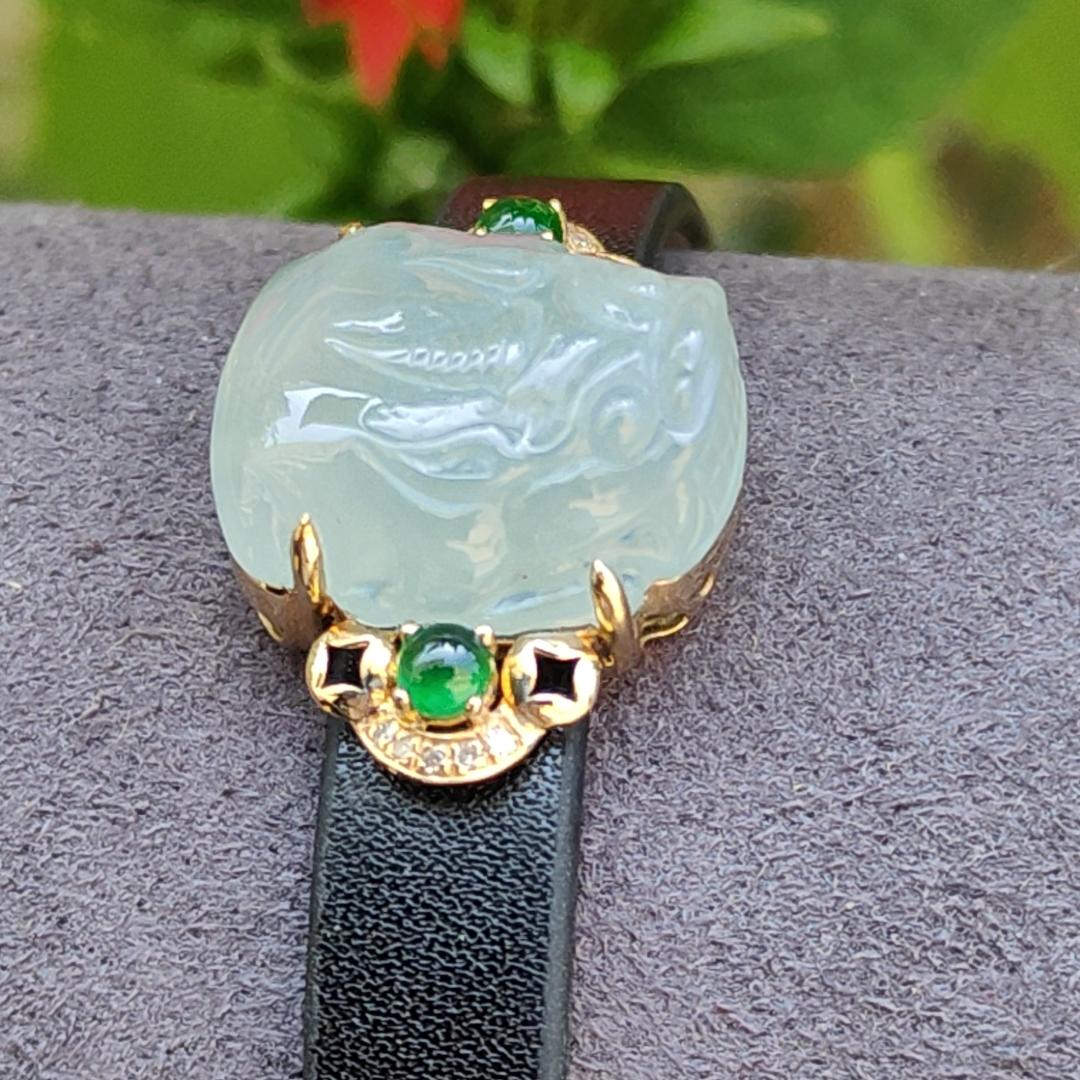 Light Green Hue Natural Type A Jadeite Jade crafted as Pixiu set on 18k Gold with 2 Green Cabochon and diamonds, adding PU wrist band upgraded elegant style bracelet, certificate weigh 4.44 grams, measurement 16.6 * 14.1 * 7.5 mm (18kpw1)