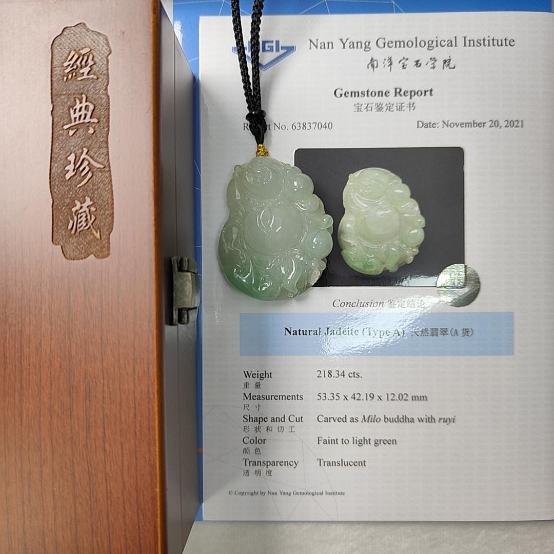 Natural Type A Jadeite Jewellery Pendant carved as Milo Buddha with Ruyi with Gemstone report from NGI weighs at 218.34 grams , 53.35 * 42.19 * 12.02 mm , Translucent with faint to light green with good translucency premium quality pendant (pendant156)