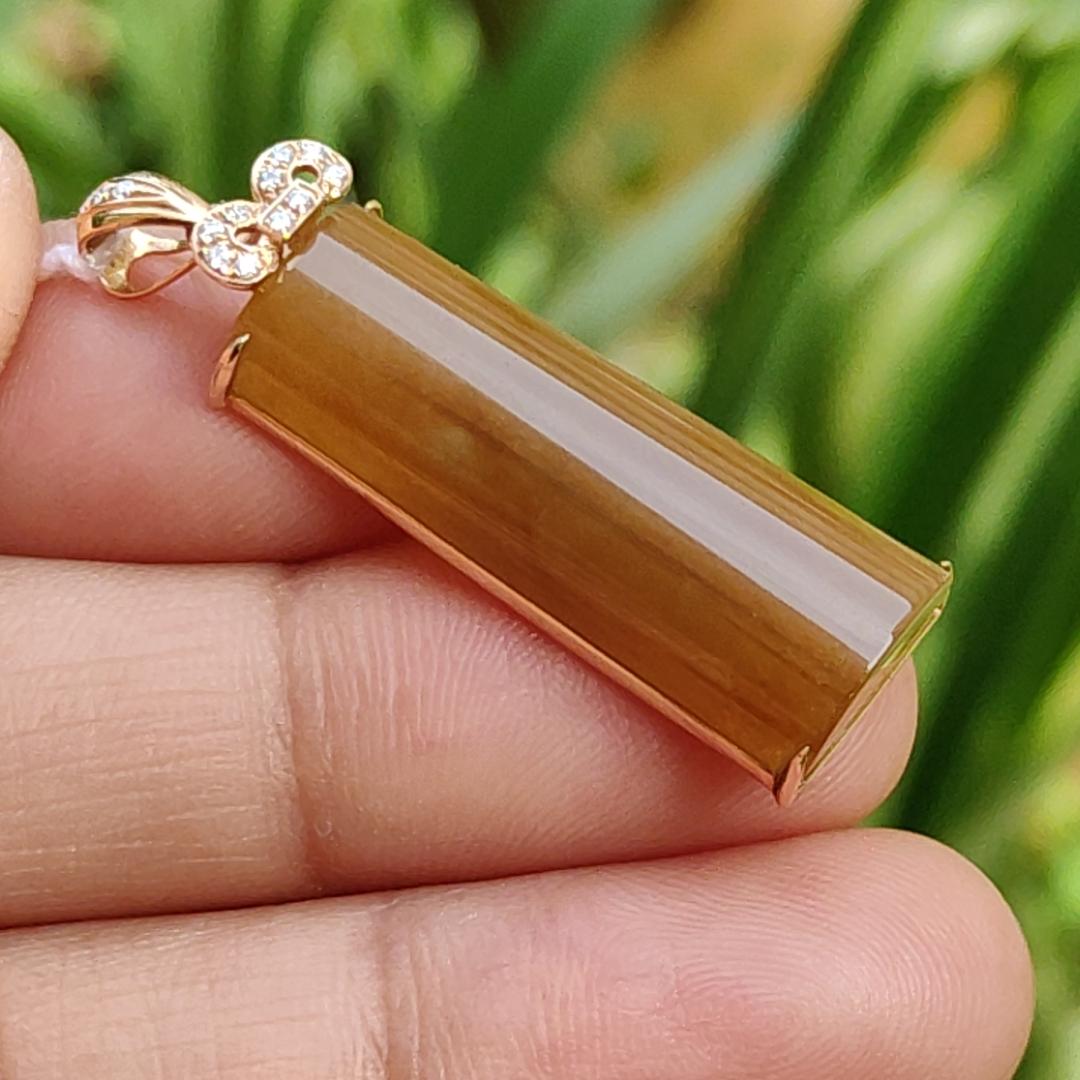 High Quality Brownish Yellow Natural Type A Jadeite Jade crafted as Nothing set on 18k Gold as Pendant, certificate weighs 4.49 grams, measurement 35 * 10.2 * 6.2 mm (18kp59)