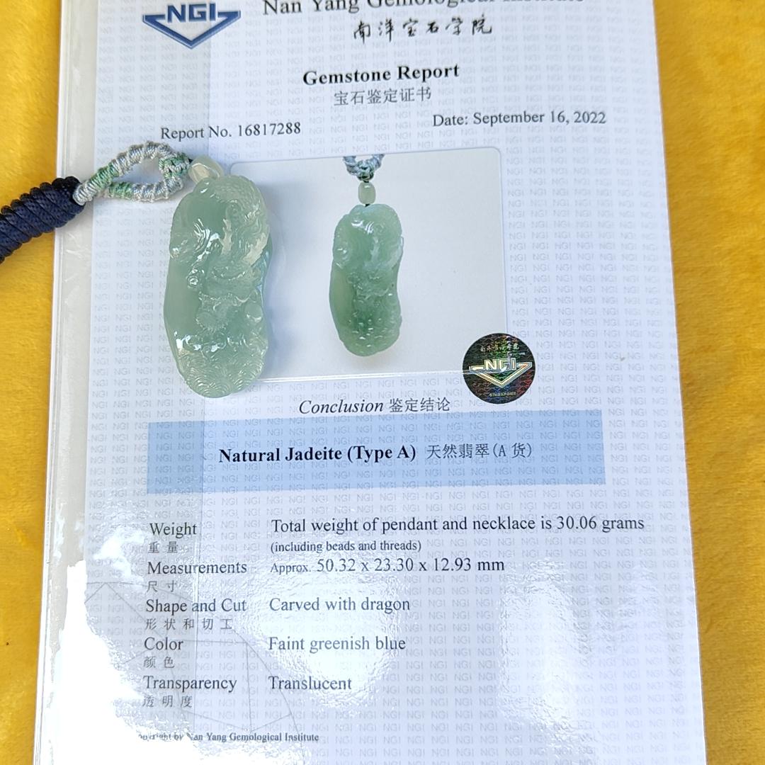 Natural Type A Jadeite Jewellery Pendant carved with dragon weighs at 30.06 grams , 50.32 * 23.30 * 12.93 mm - with Gemstone report from NGI - Very Good Translucency with faint greenish blue (pendant140)