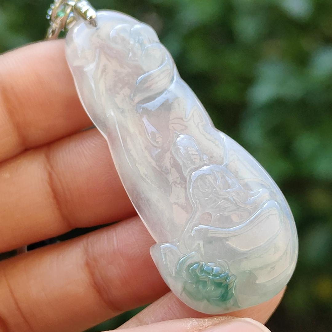 Icy variety Translucent with green Natural Type A Jadeite Pendant Necklace crafted as the faceless buddha with symbols of Holy and blessed blessings of wealth, prosperity and happiness with certificate weigh 11.02 grams, 49.9 * 19.9 * 7 mm (pendant34)