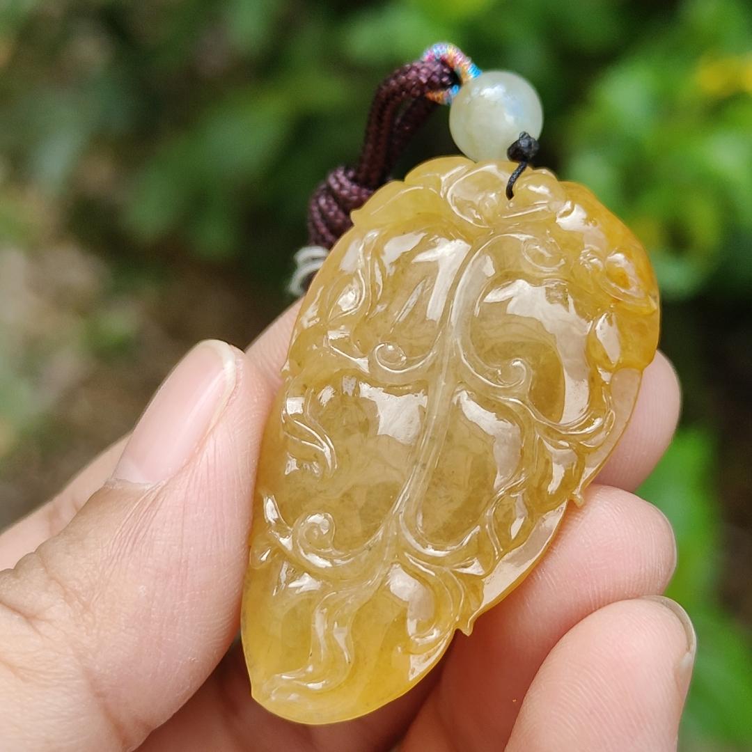 Very fine and old full Yellow Natural Type A Jadeite Pendant carved as a leave and a Mythical Beast on it with certificate weight 16.02 grams, 44 * 26 * 10 mm meaning Good luck and auspiciousness (pendant107)