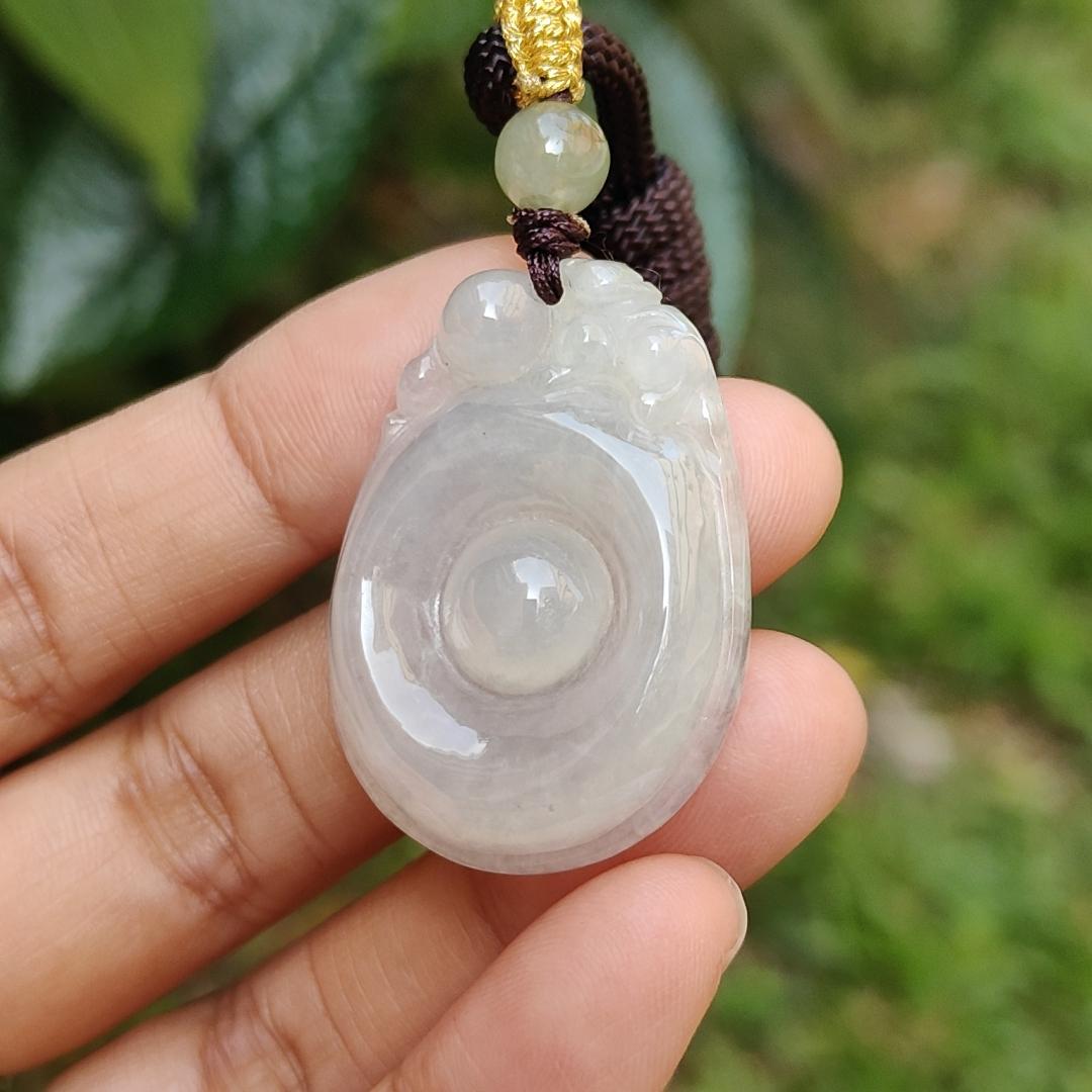 Semi Icy Translucent Natural Type A Jadeite Jade crafted with Fubei as pendant with certificate weigh 9.97 grams, measurement 34.9 * 25 * 7 mm (pendant195)