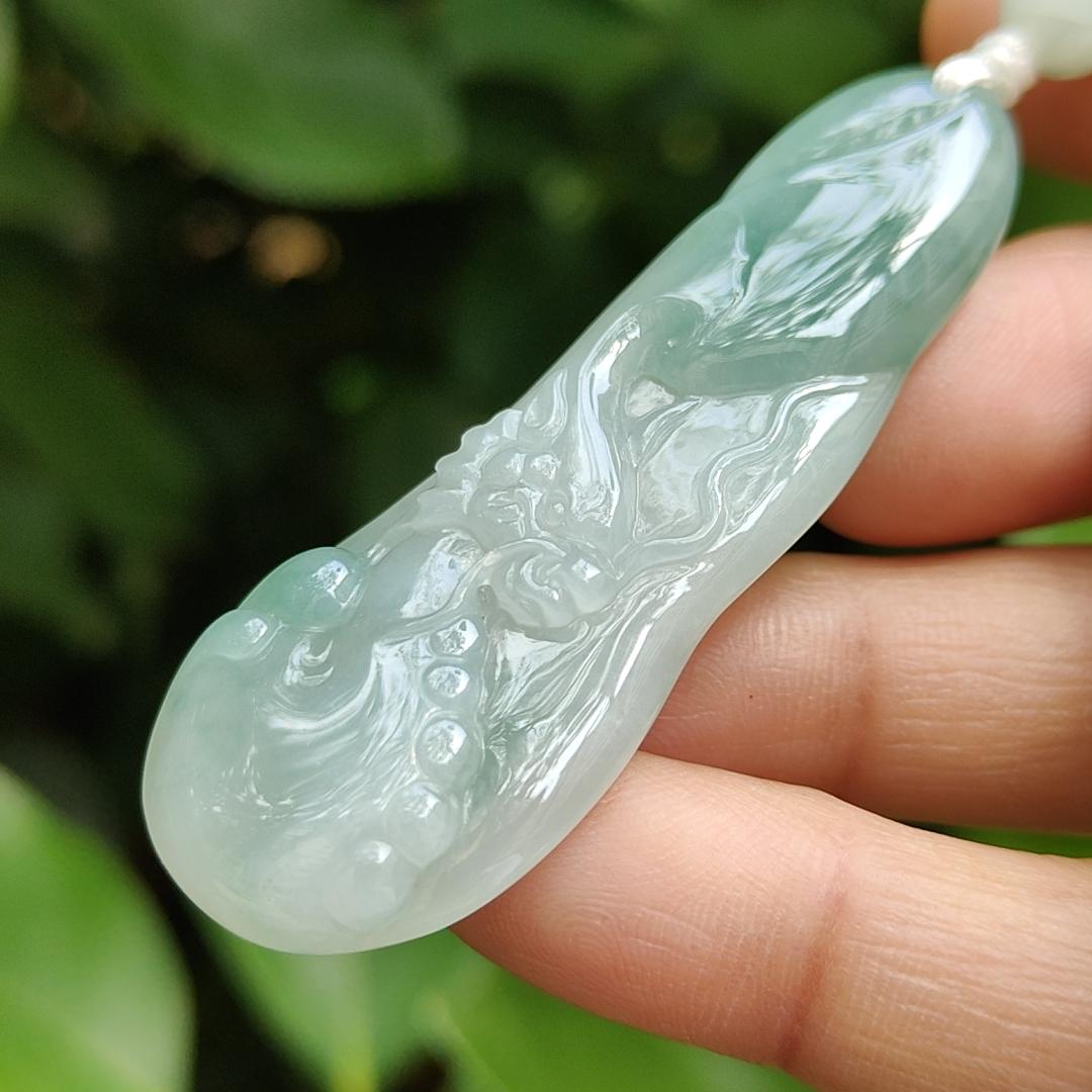 Good Quality Beautiful Natural Type A Jadeite Jade Light Green with Green Hue crafted with Dragon as Pendant, QIC labs approved certificated weigh 15.74 grams, measurements 56 * 20.5 * 6.2 mm (pendant296)