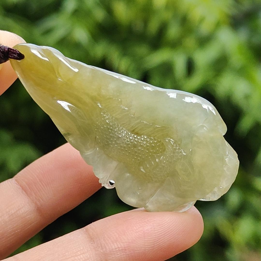 Premium Icy Yellow Natural Type A Jadeite Jade crafted with Dragon as Pendant certificate weighs 15.64 grams, measurement 50.6 * 27 * 11.5 mm (pendant253)