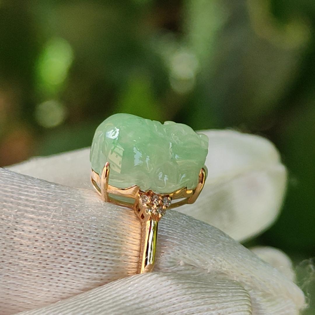 Good Quality Natural Type A Jadeite Jade crafted with light green pixiu set on 18k gold as Ring with certificate weighs 2.58 grams, measurement 12.1 * 9.6 * 5.3 mm (18kring24)