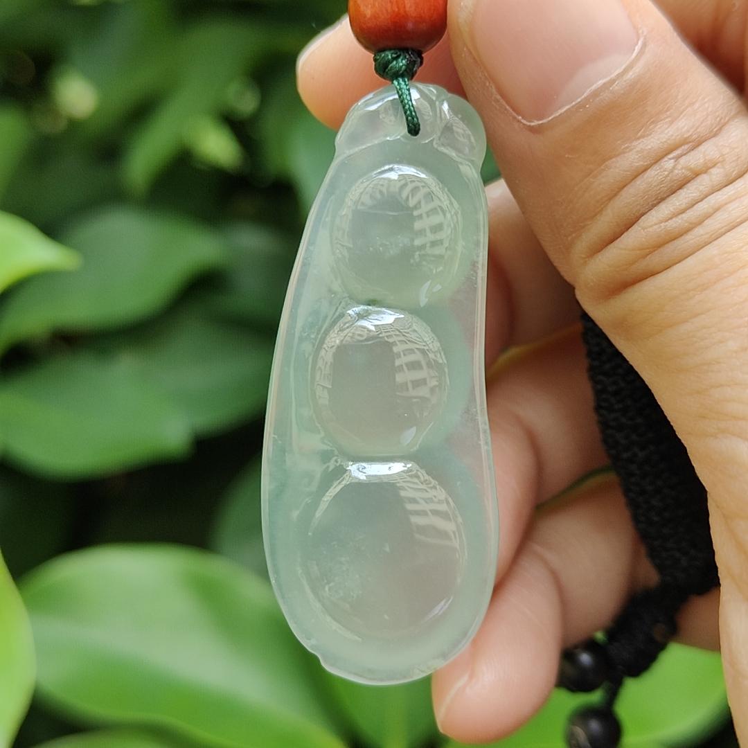 Premium Quality Icy Translucent Green Hue crafted as French Bean Natural Type A Jadeite Jade as Pendant, certificate weighs 12.37 grams, measurement 49.9 * 20 * 7.6 mm (pendant297)