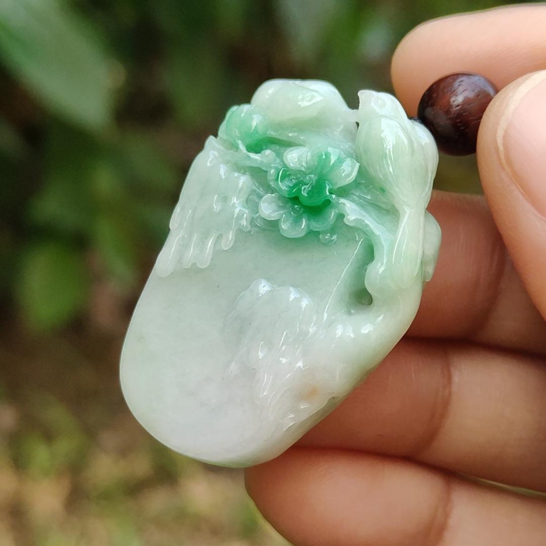 Beautifully crafted with birds and flower light green Natural Type A Jadeite Jade as Pendant, certificate weighs 18.63 grams, measurement 38.3 * 25.9 * 9.6 (pendant247)