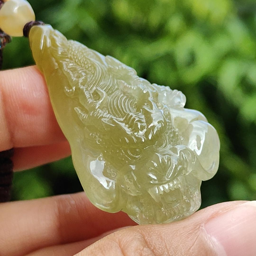 Premium Icy Yellow Natural Type A Jadeite Jade crafted with Dragon as Pendant certificate weighs 15.64 grams, measurement 50.6 * 27 * 11.5 mm (pendant253)