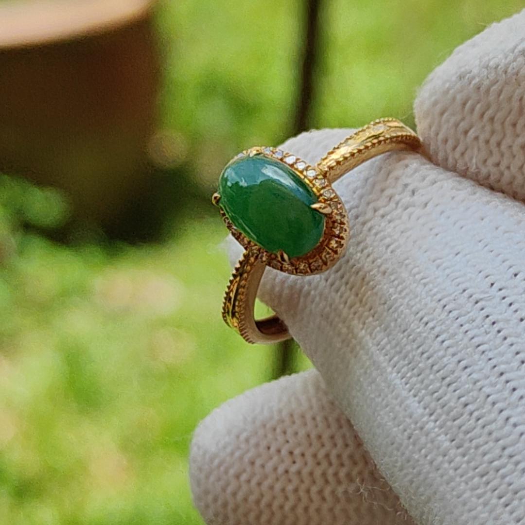 Green Natural Type A Jadeite Jade Cabochon 8.8 * 5.6 * 2.5 mm crafted with oval shape set on 18k Gold as ring with certificate weighs 1.92 grams (18kring25)