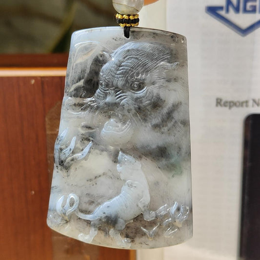 Very Unique Double Theme Natural Type A fine Jadeite pendant carved as Tiger [Front] , Landscape [Back] , with NGI Gemstone report weighs 30.33grams , 54.29 * 37.61 * 5.73 mm , near colorless with patches of grey pendant for your daily wear (pendant158)