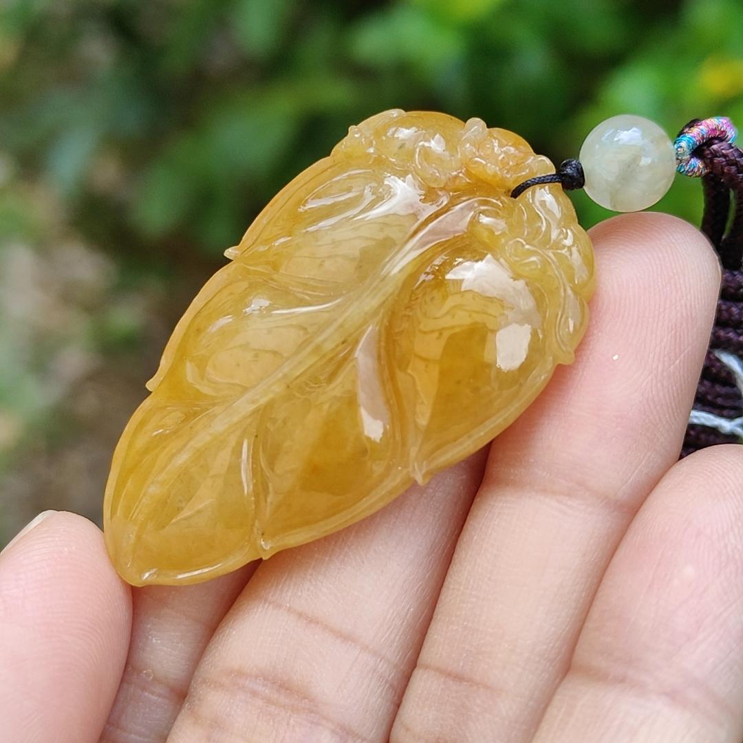 Very fine and old full Yellow Natural Type A Jadeite Pendant carved as a leave and a Mythical Beast on it with certificate weight 16.02 grams, 44 * 26 * 10 mm meaning Good luck and auspiciousness (pendant107)