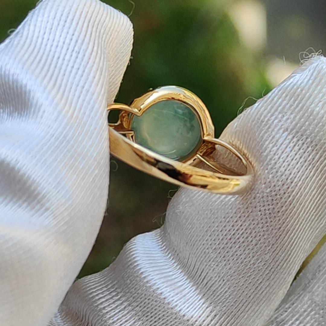 Icy Floating Green Patches Cabochon Natural Type A Jadeite Jade set on 18k gold as a ring with certificate weigh 2.06 grams, measurement 8.9 * 8.8 * 4.2 mm, finger size 16.8 mm (18kring19)